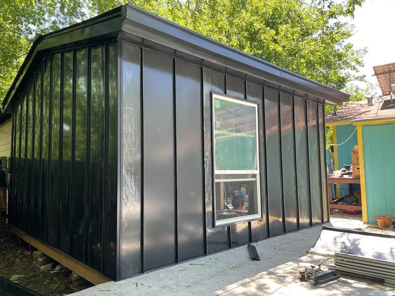 Black standing seam metal wall panels for Roof Inspection in Jaffrey