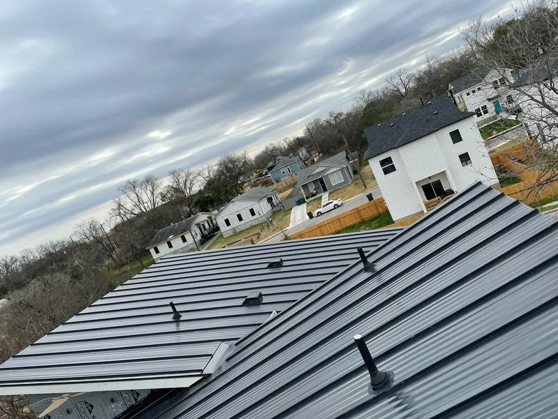 Standing seam metal roof panels with vents for Skylight Repair in Jaffrey